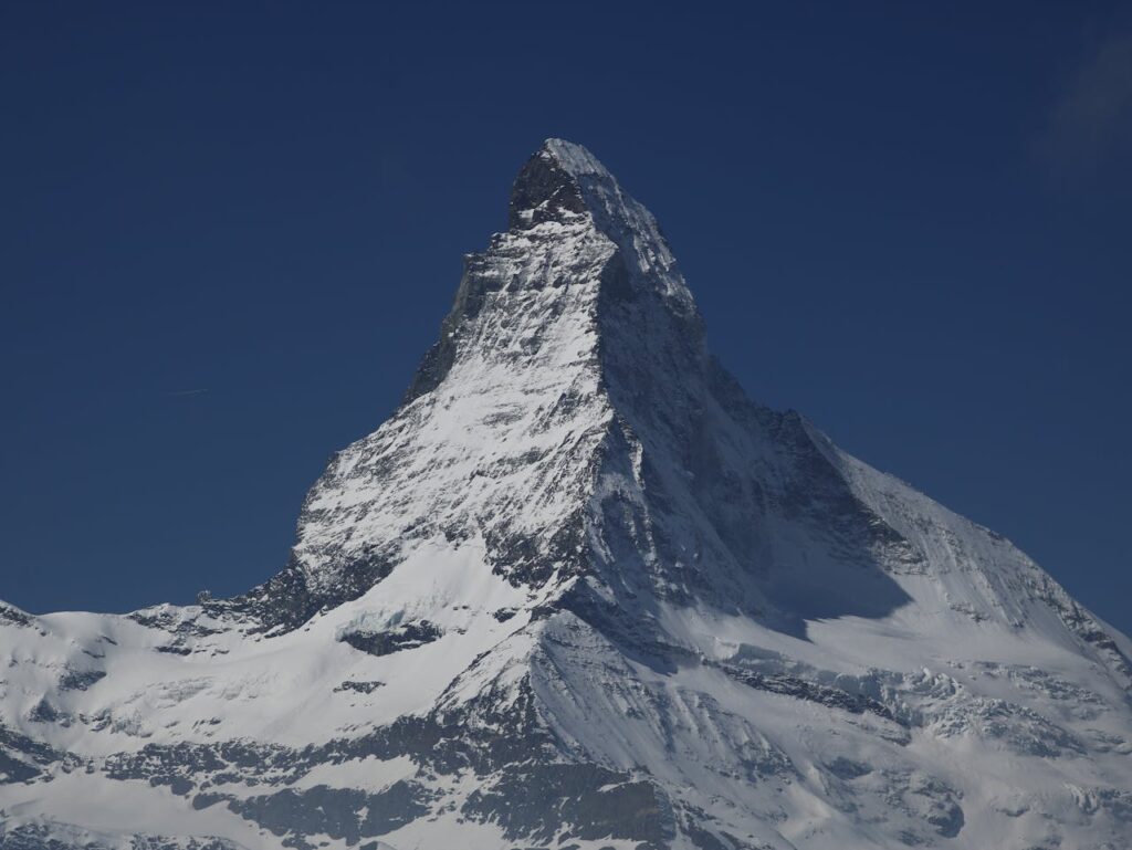 pexels photo 11621543 Stunning view of the iconic snowcapped Matterhorn peak under a clear blue sky.